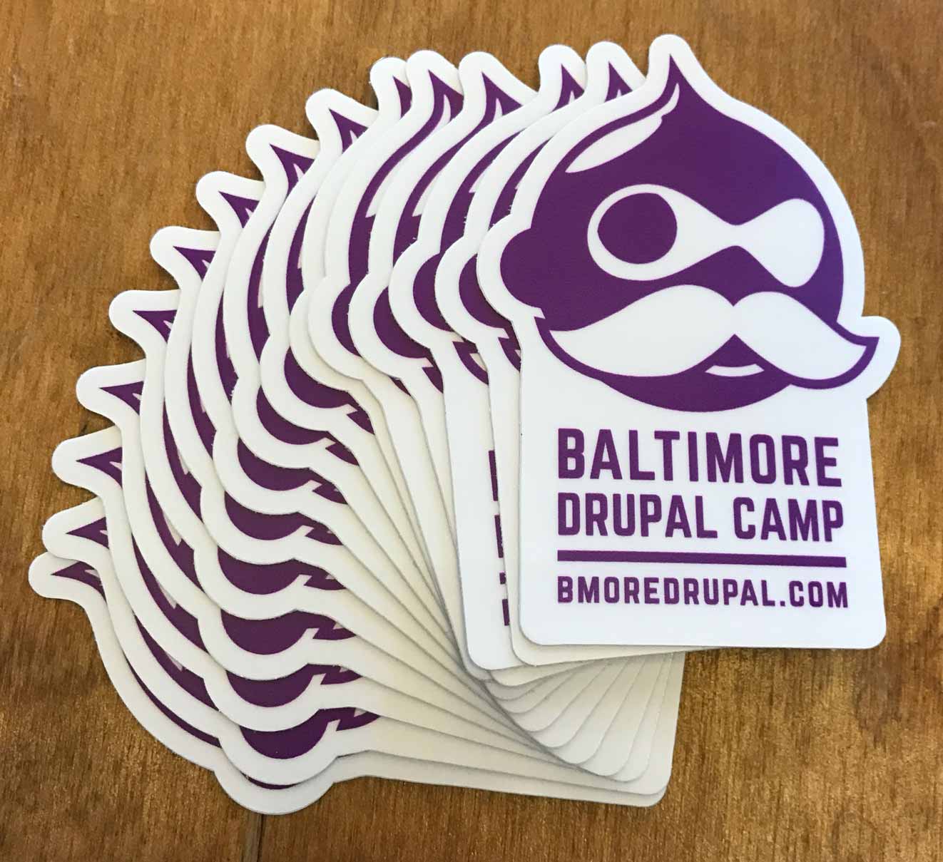 Baltimore Drupal Camp stickers with Drupal Boh icon