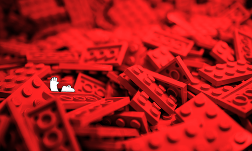 a happy yeti, potentially drowning in a sea of red legos