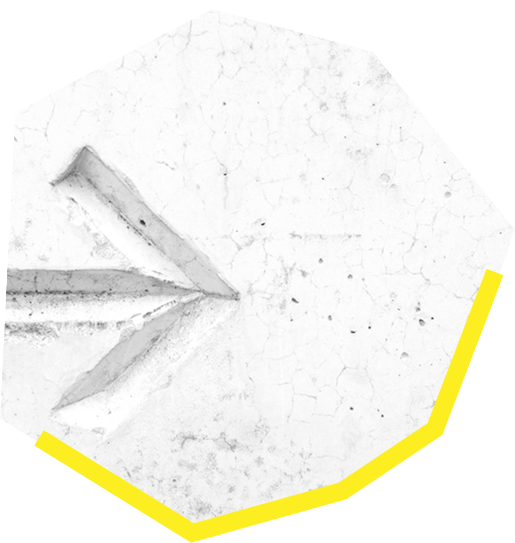 arrow chiseled into marble pointing right