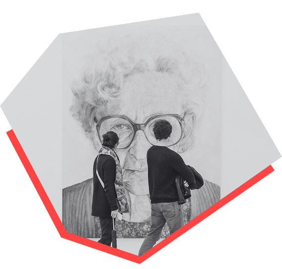 A black and white photo of two people at an art gallery, observing a painting of an older women with glasses. 