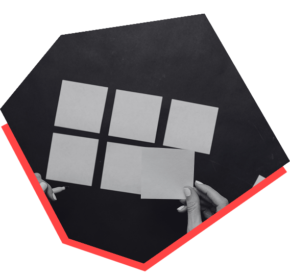 A black and white photo of sticky notes aligned in a group of 6. 