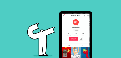 Yeti pointing to phone featuring Last Call Media's TikTok profile