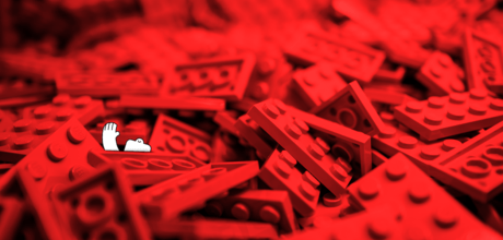 a happy yeti, potentially drowning in a sea of red legos