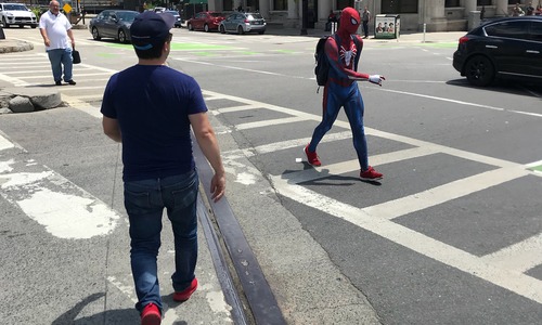 Kelly meets Spiderman in a Boston crosswalk
