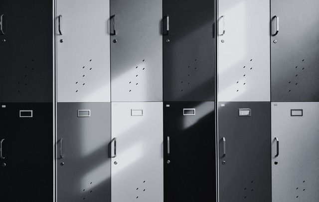 A black and white photo of school lockers. 