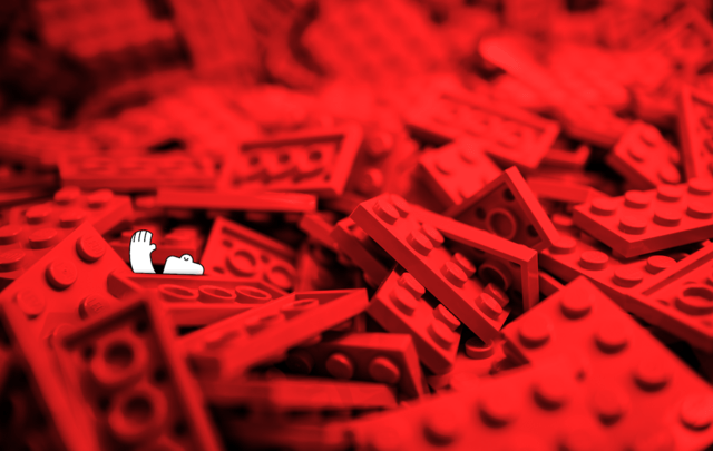 a happy yeti, potentially drowning in a sea of red legos