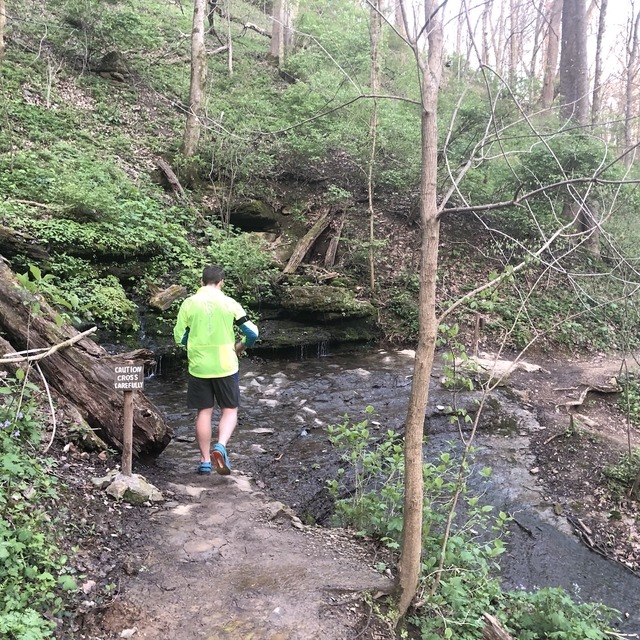 Rob crossing a creek on the morning run