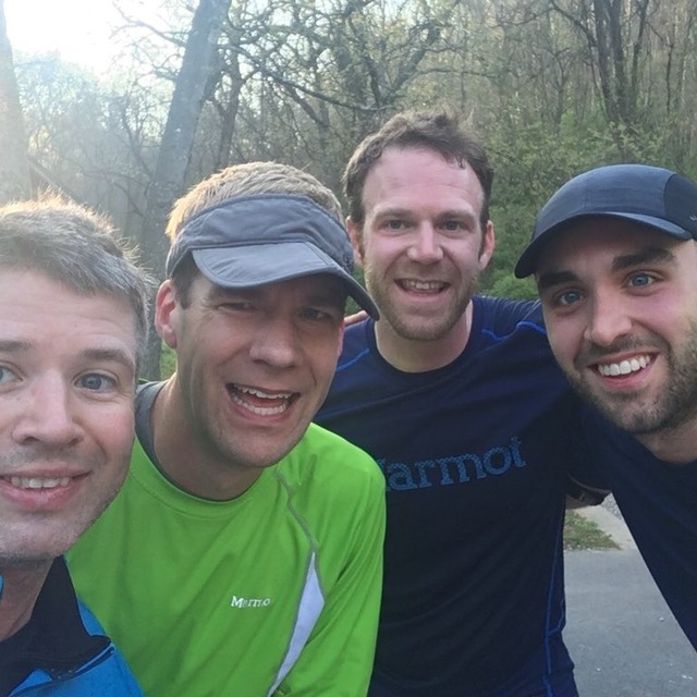 Selfie of Sean and Rob out running with others from the conference