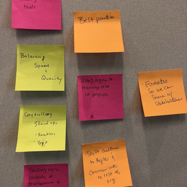 Sticky notes with potential agenda items written by attendees